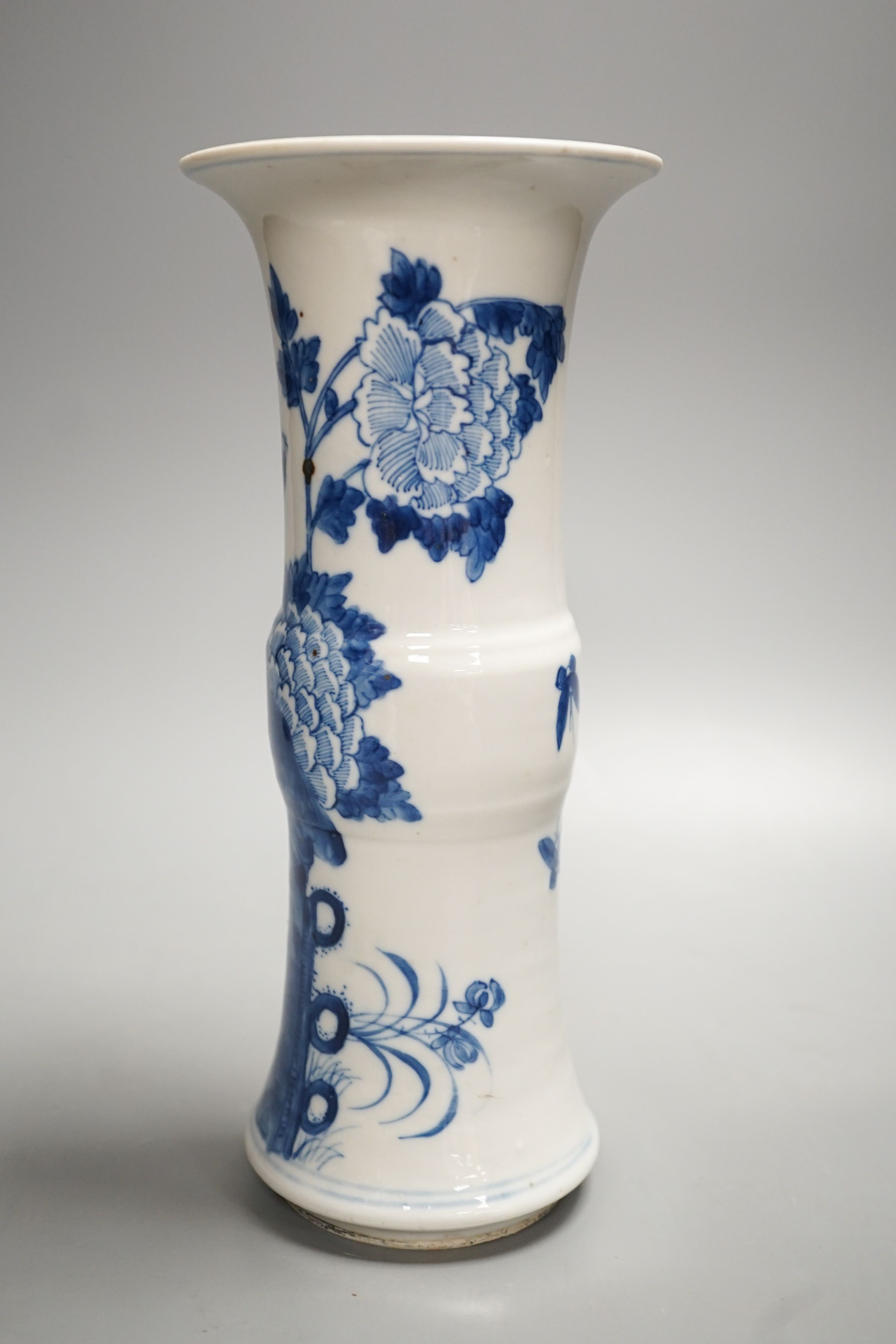 A 19th century Chinese blue and white beaker vase 26cm